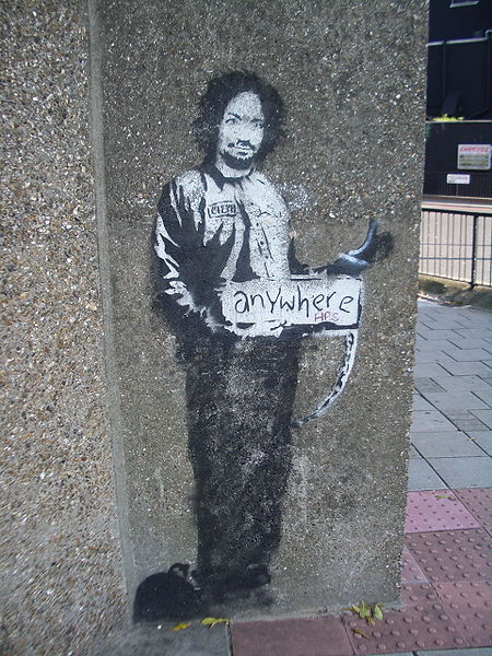 450px Banksy Hitchhiker to Anywhere Archway 2005 15 Memorable Street Art Masterpieces by Banksy